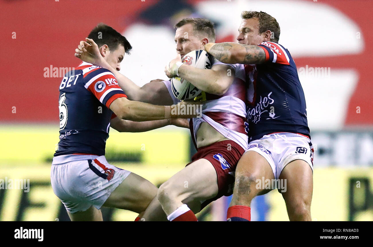 Wigan Warriors Dan Sarginson Is Tackled By Sydney Roosters Jake Friend Right And Sydney Roosters Luke Keary During The World Club Challenge Match At The Dw Stadium Wigan Stock Photo Alamy
