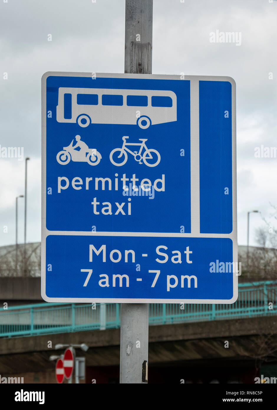 Taxi permitted sign with timings, Belfast Stock Photo Alamy