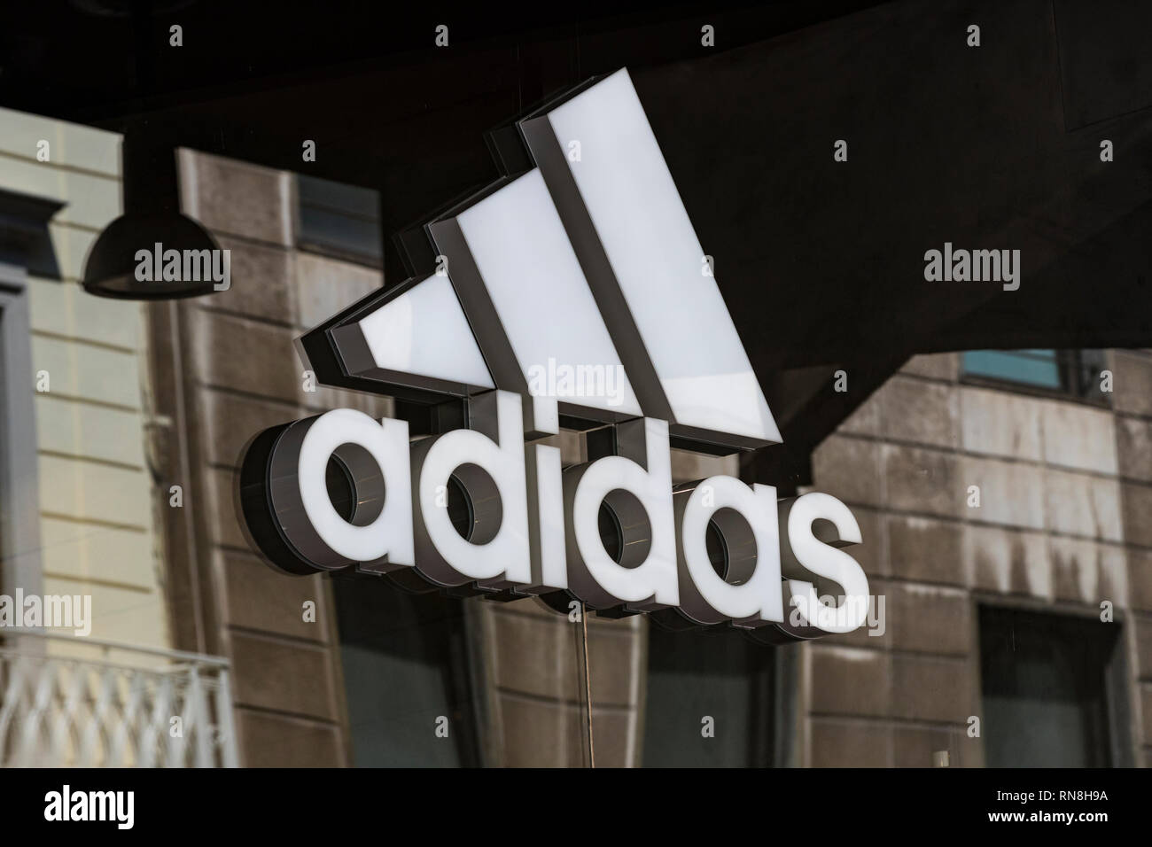 MILAN, ITALY - 2 JUNE, 2018: Logo of the Adidas store on the street of Milan  in Italy Stock Photo - Alamy