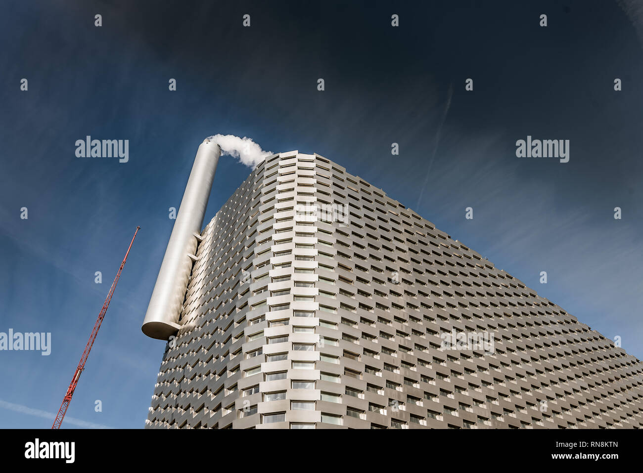 Futuristic incinerator with a big chimney and a 600 meters long ski slope on the roof, Copenhagen, February 16, 2019 Stock Photo