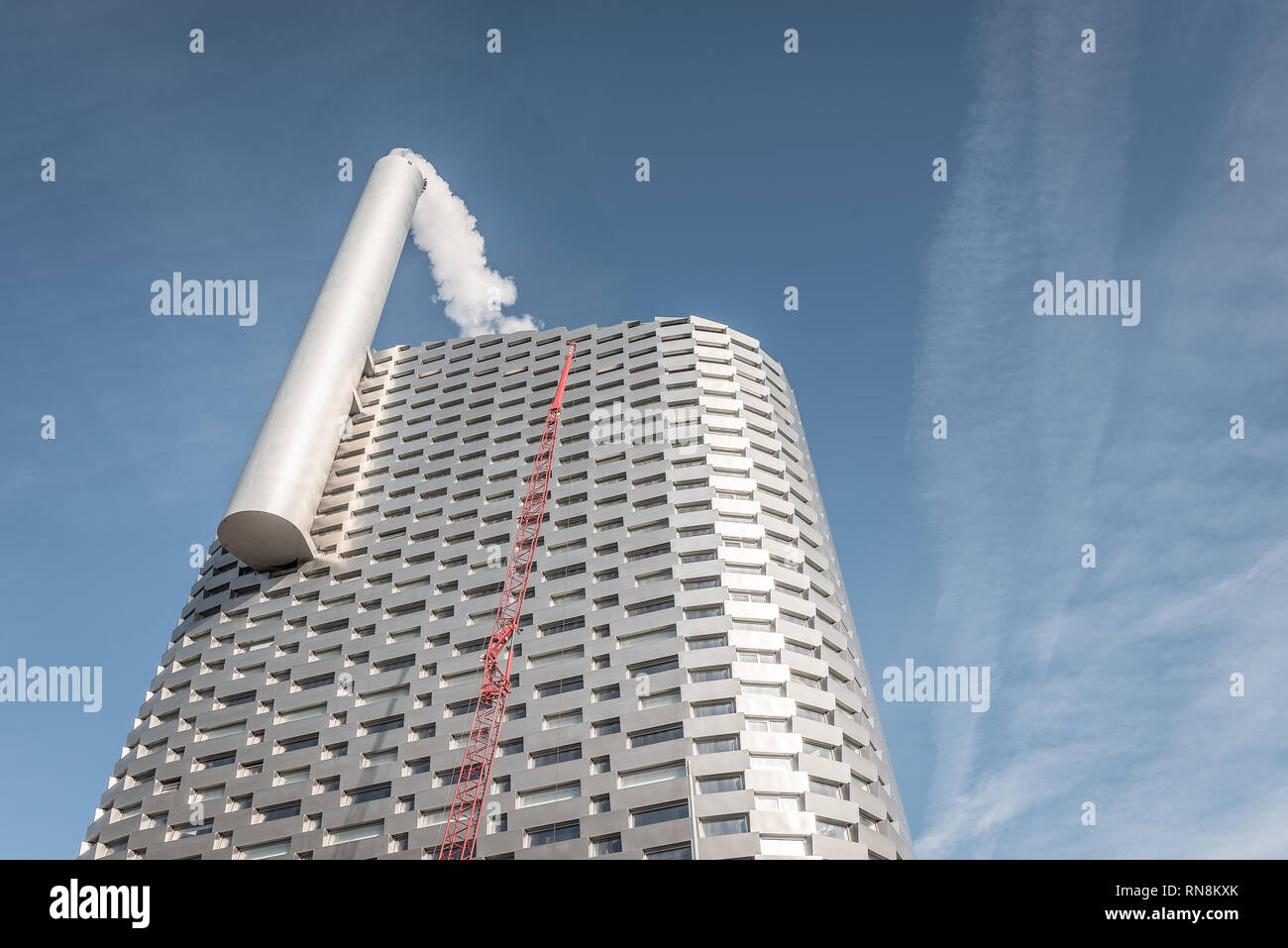 Danish design of an futuristic incinerator with a big chimney and a 600 meters long ski slope on the roof, Copenhagen, February 16, 2019 Stock Photo