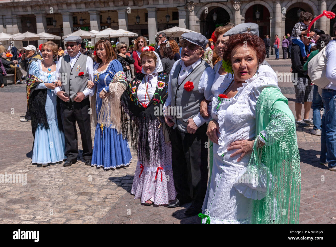 Group Of Local Wearing Traditional San Isidro Madrid Costumes In Plaza 