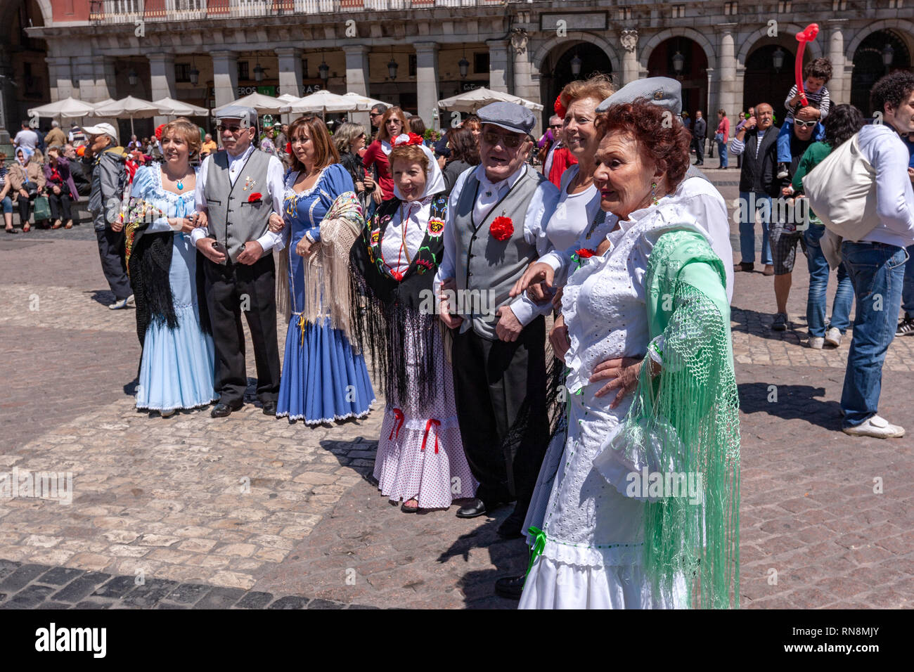 Group Of Local Wearing Traditional San Isidro Madrid Costumes In Plaza 