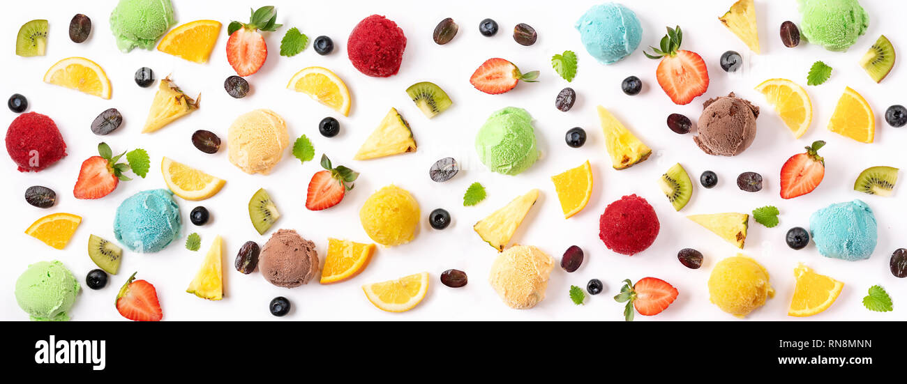 Berries and ice cream balls on white background. Summer concept. Banner Stock Photo