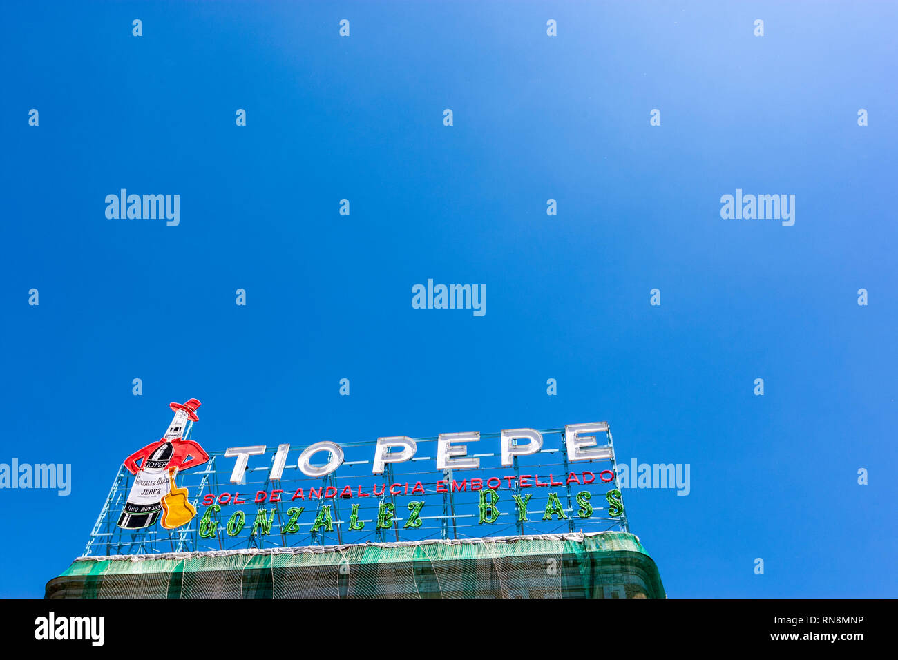 Legendary Tio Pepe neon sign  advertisement, Puerta del Sol, Madrid, Spain Stock Photo