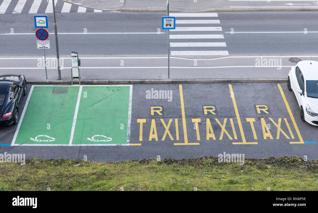 Empty parking spaces for taxis and electric cars - Koper, Slovenia Stock Photo