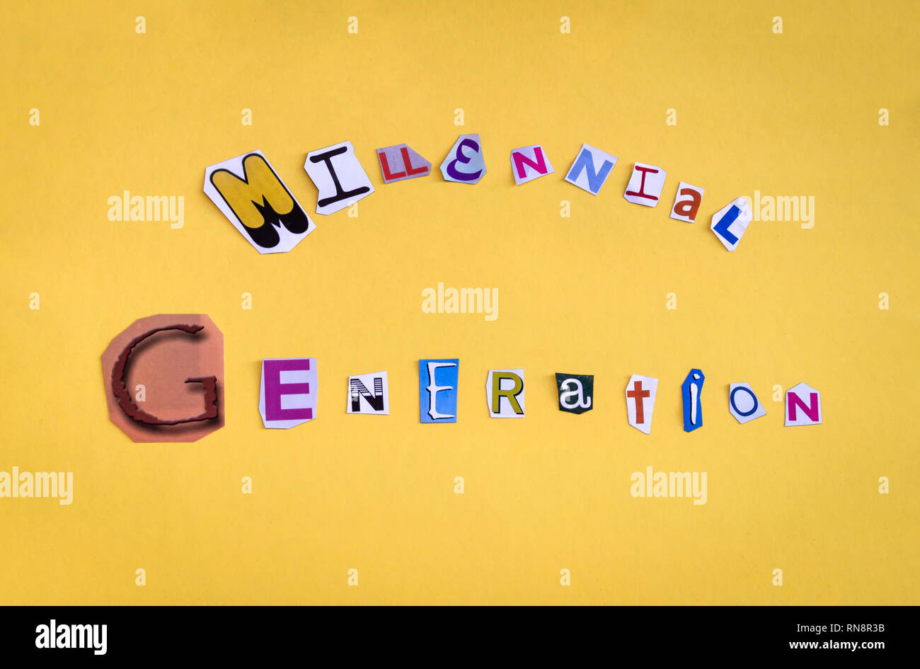 Words Millennial Generation formed with cut out letters. Millennial generation, the young people of the media and digital technologies. Stock Photo