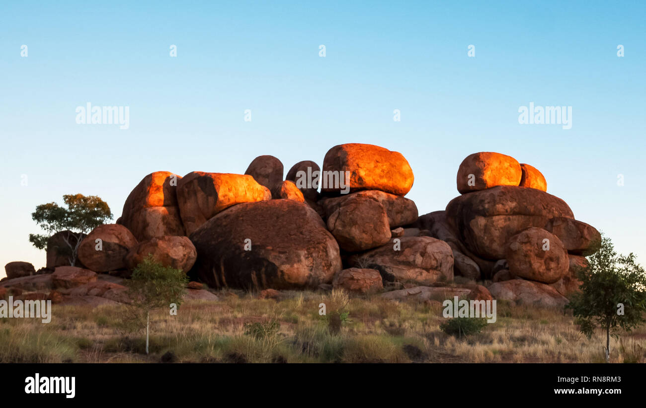 devil's marbles in australia's northern territory at sunrise Stock Photo