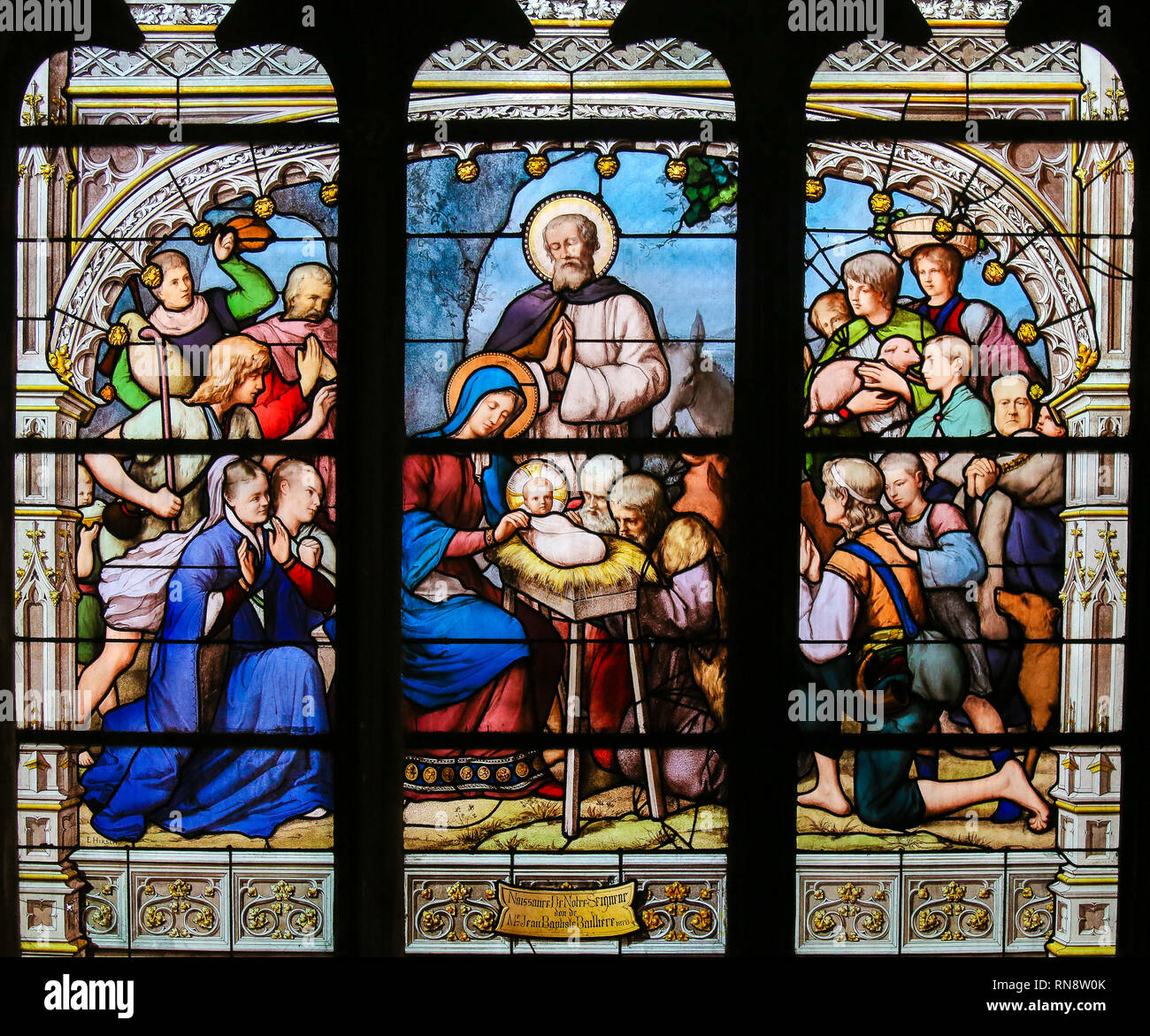 Stained Glass in the Church of Saint Severin, Latin Quarter, Paris, France, depicting a Nativity Scene at Christmas Stock Photo