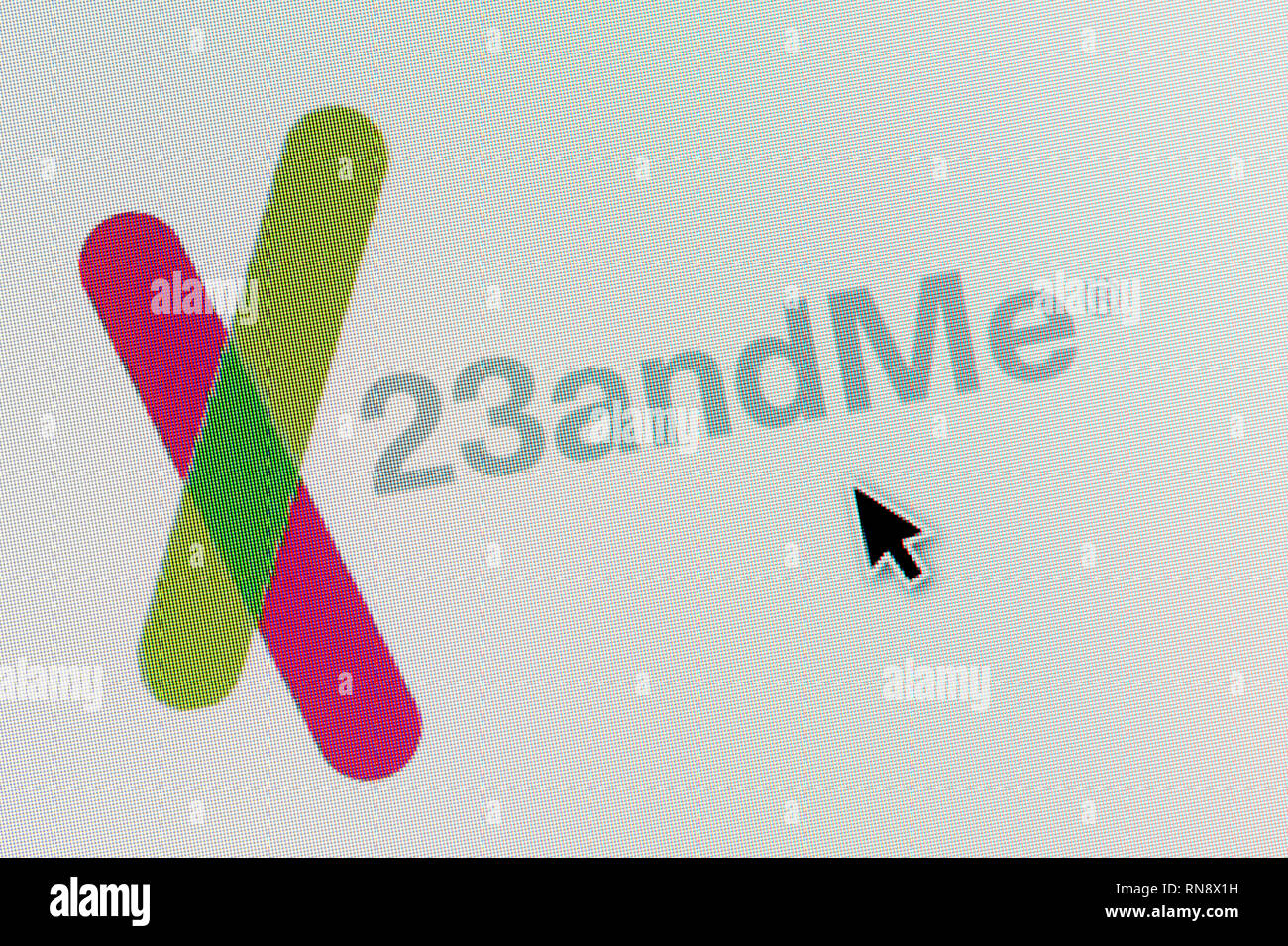 The logo of 23andme is seen on a computer screen along with a mouse cursor (Editorial use only) Stock Photo