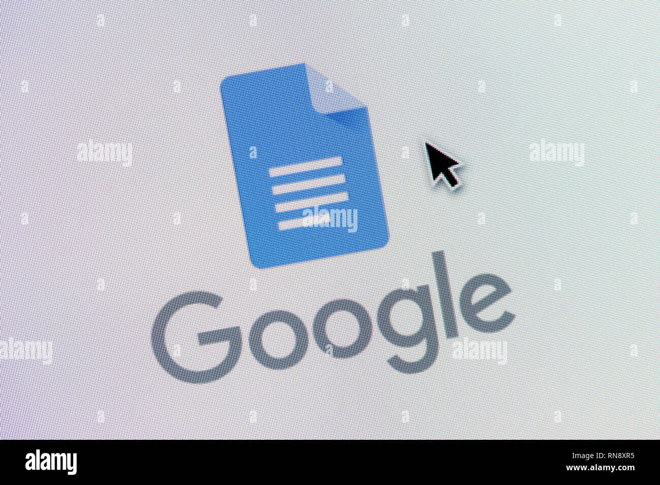 The logo of Google Docs is seen on a computer screen along with a mouse cursor (Editorial use only) Stock Photo