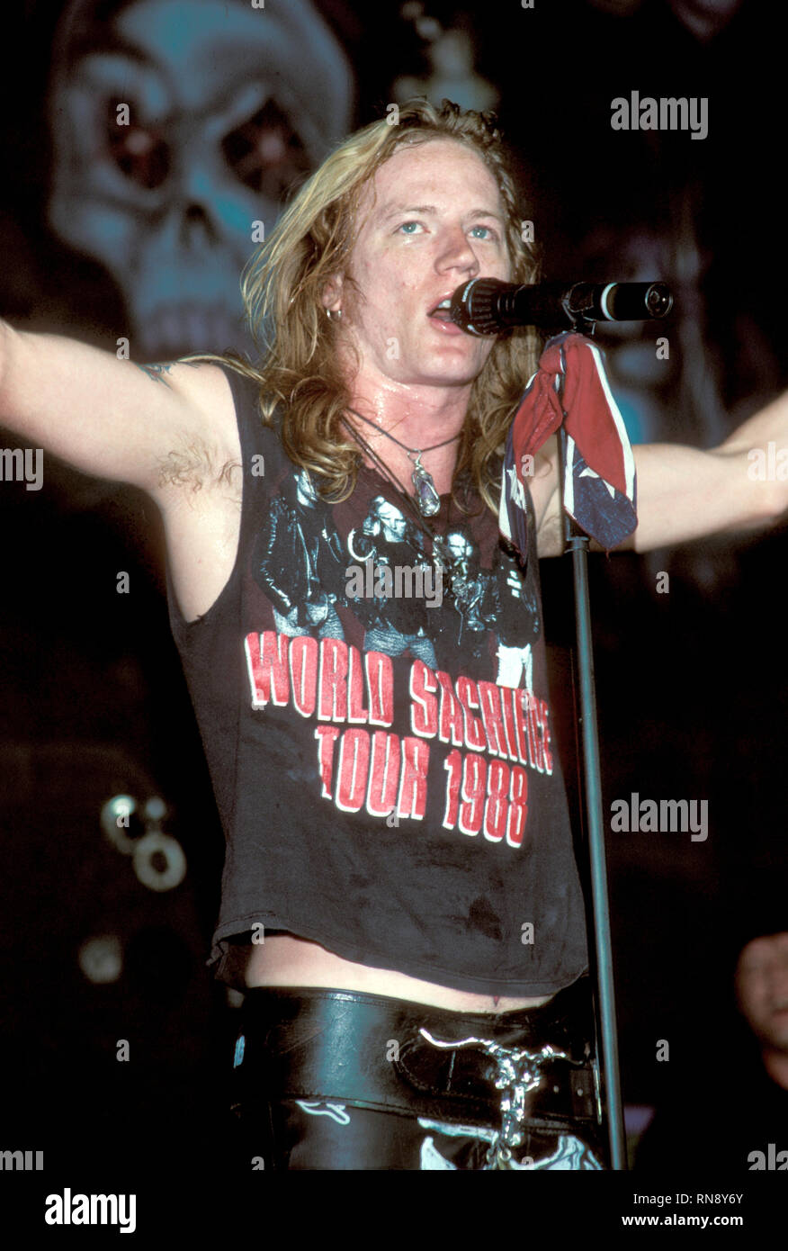 Dangerous Toys lead singer Jason McMaster is shown performing on stage