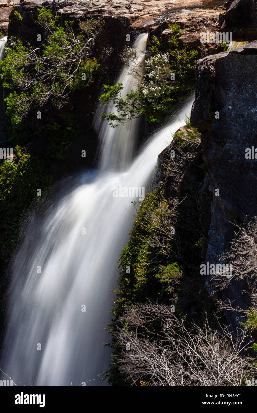 Smooth water flow in rainforest waterfall Stock Photo Alamy