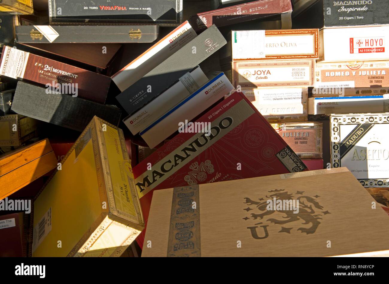 A stack of empty cigar boxes is up for sale at Telford's Cigar Lounge