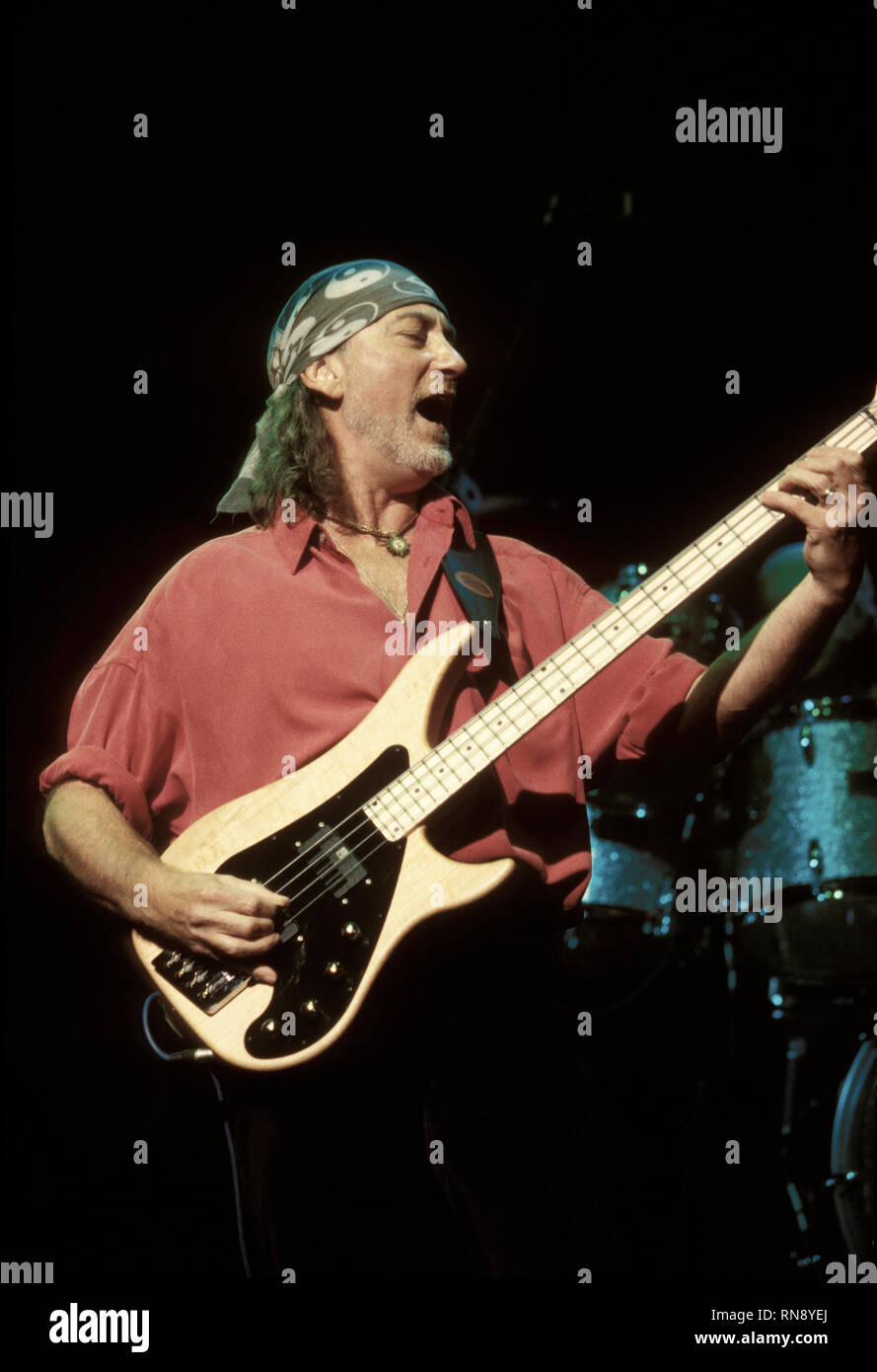 Deep Purple vocalist Ian Gillan is shown performing on stage during a 'live' concert appearance. Stock Photo