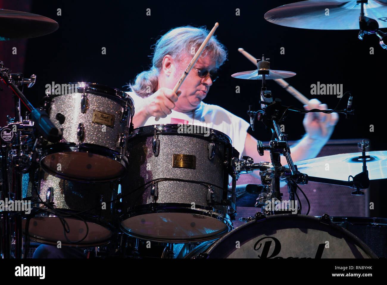 Deep Purple drummer Ian Paice is shown performing on stage during a 'live' concert appearance. Stock Photo