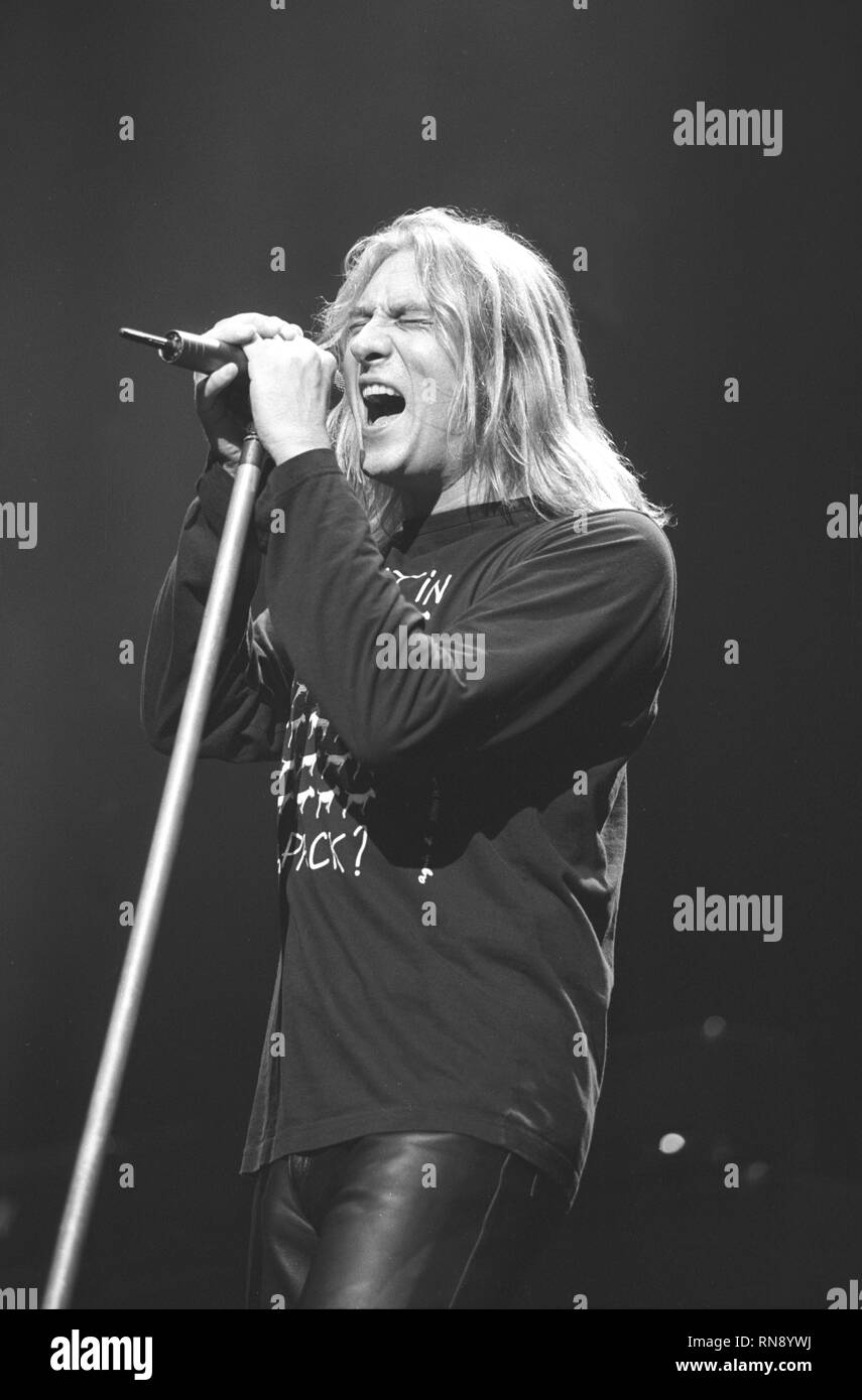 Def Leppard vocalist Joe Elliott is shown performing on stage during a concert appearance Stock
