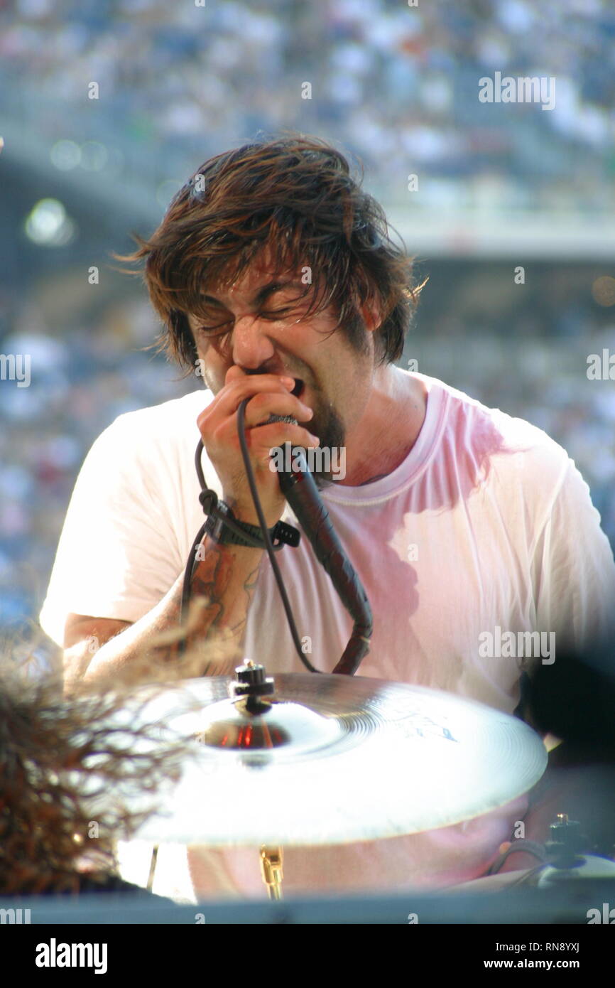 Deftones vocalist Chino Moreno is shown singing for fans during a "live