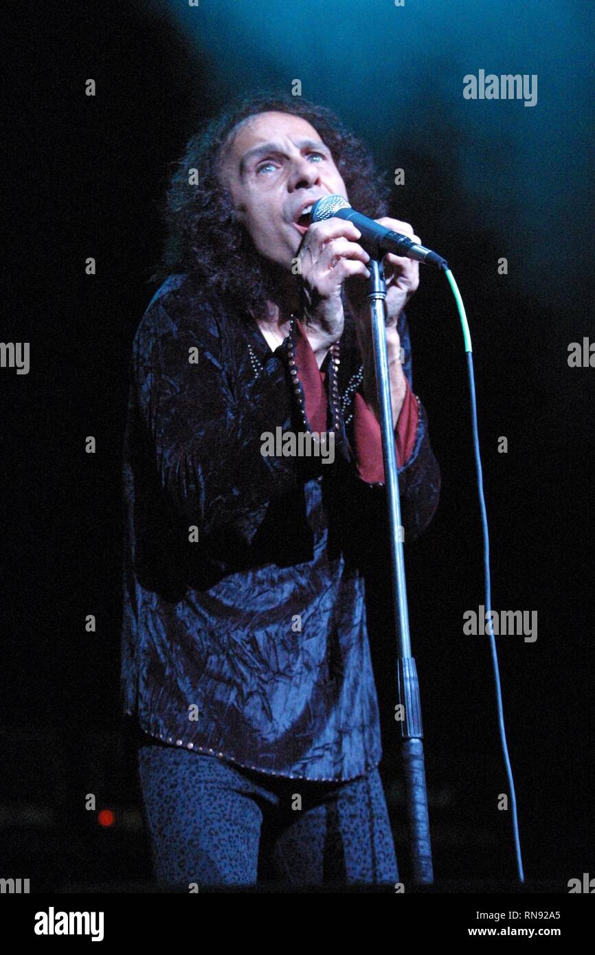 Heavy metal vocalist , Ronnie James Dio, who has performed with Elf, Rainbow, Black Sabbath, and his own band Dio, is shown during a live Dio performance. Stock Photo