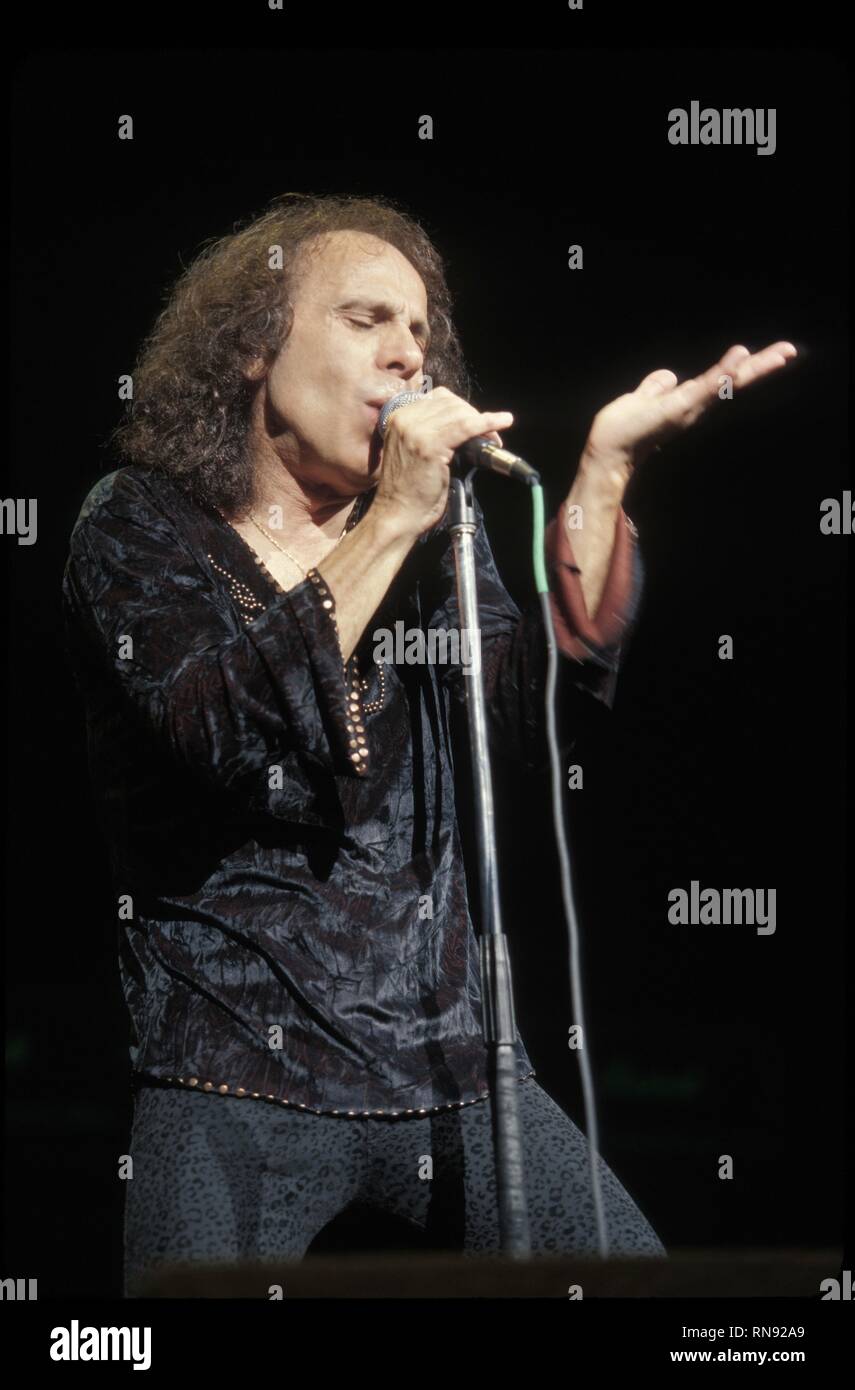Heavy metal vocalist , Ronnie James Dio, who has performed with Elf, Rainbow, Black Sabbath, and his own band Dio, is shown during a live Dio performance. Stock Photo