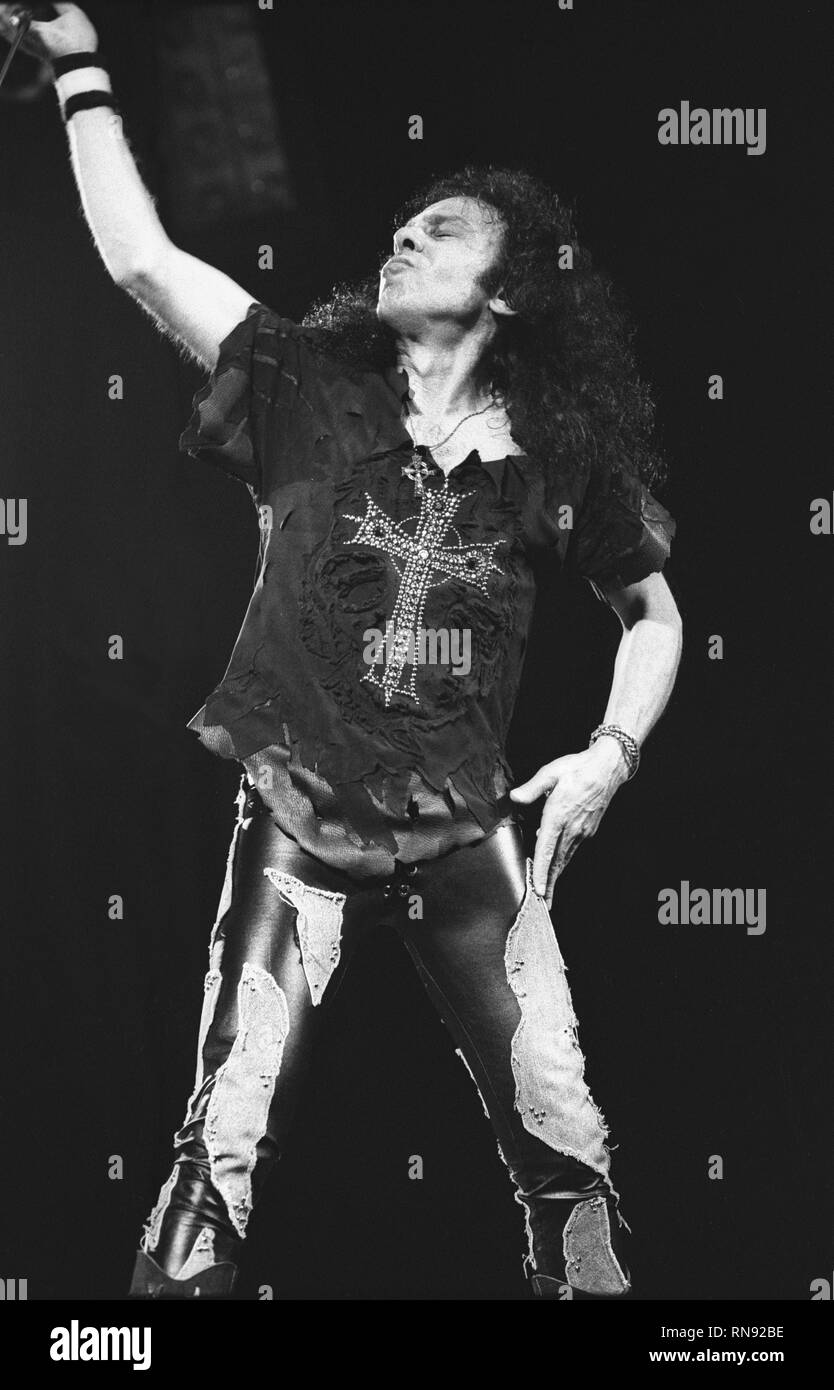 Singer Ronnie James Dio is shown performing on stage during a 'live' concert appearance. Stock Photo