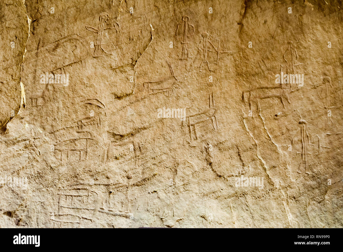 Ancient carving on the rocks, parietal art, cave painting, rock drawing in the Timna National Park, desert of Aravah valley in Israel Stock Photo