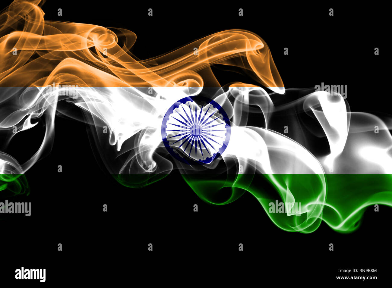 National flag of India made from colored smoke isolated on black background.  Abstract silky wave background Stock Photo - Alamy