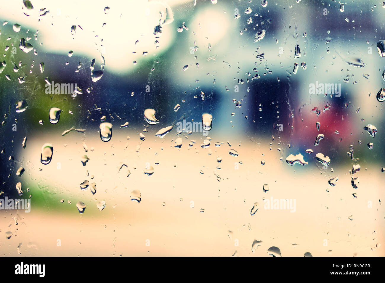 Drops of rain on glass background made with vintage Tones Stock Photo ...