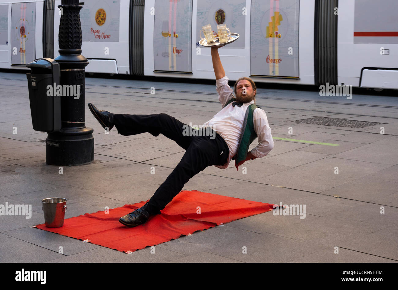 Street performer holding a pose on the street in Seville, Spain Stock Photo
