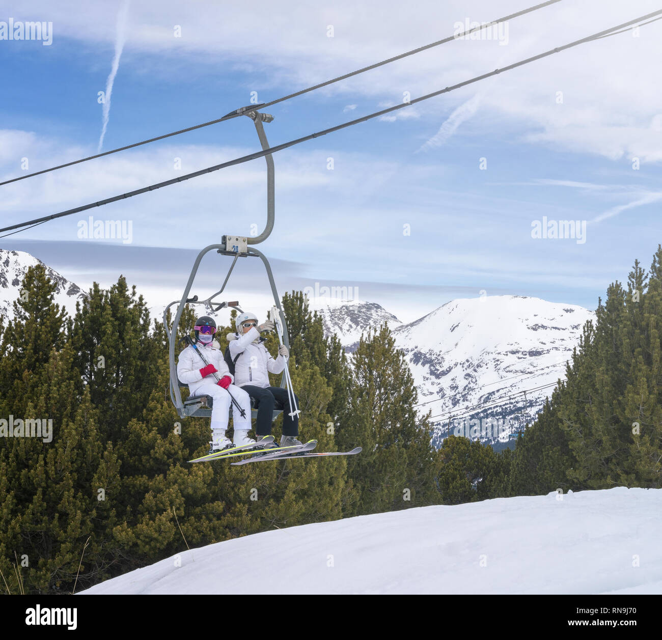 10 February 2019 - El Tarter, Andorra. Picture of skiers using the chairlift in the beautiful ski resort of El Tarter, Andorra. Stock Photo