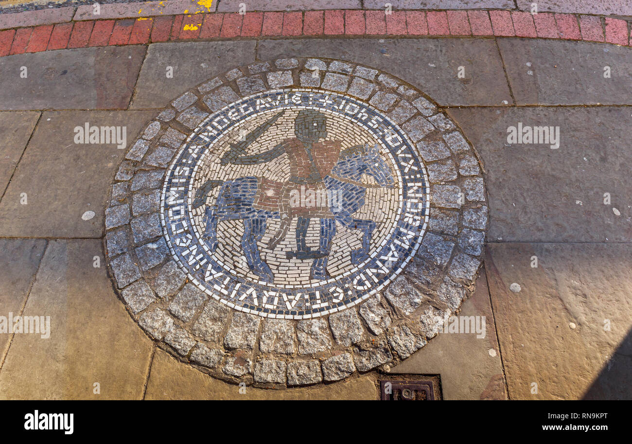 Mosaic of a mounted medieval knight on a pavement in Egham, Runnymede, Surrey, SE England, inscription: DUX NORMAND ET AQUITAINE COMIS ANDEGAVIE 1045 Stock Photo