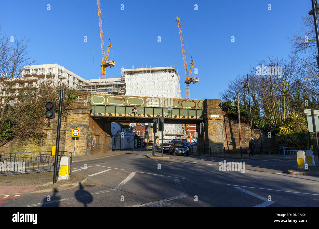 Development of a new apartment block behind the Iron Bridge, a railway