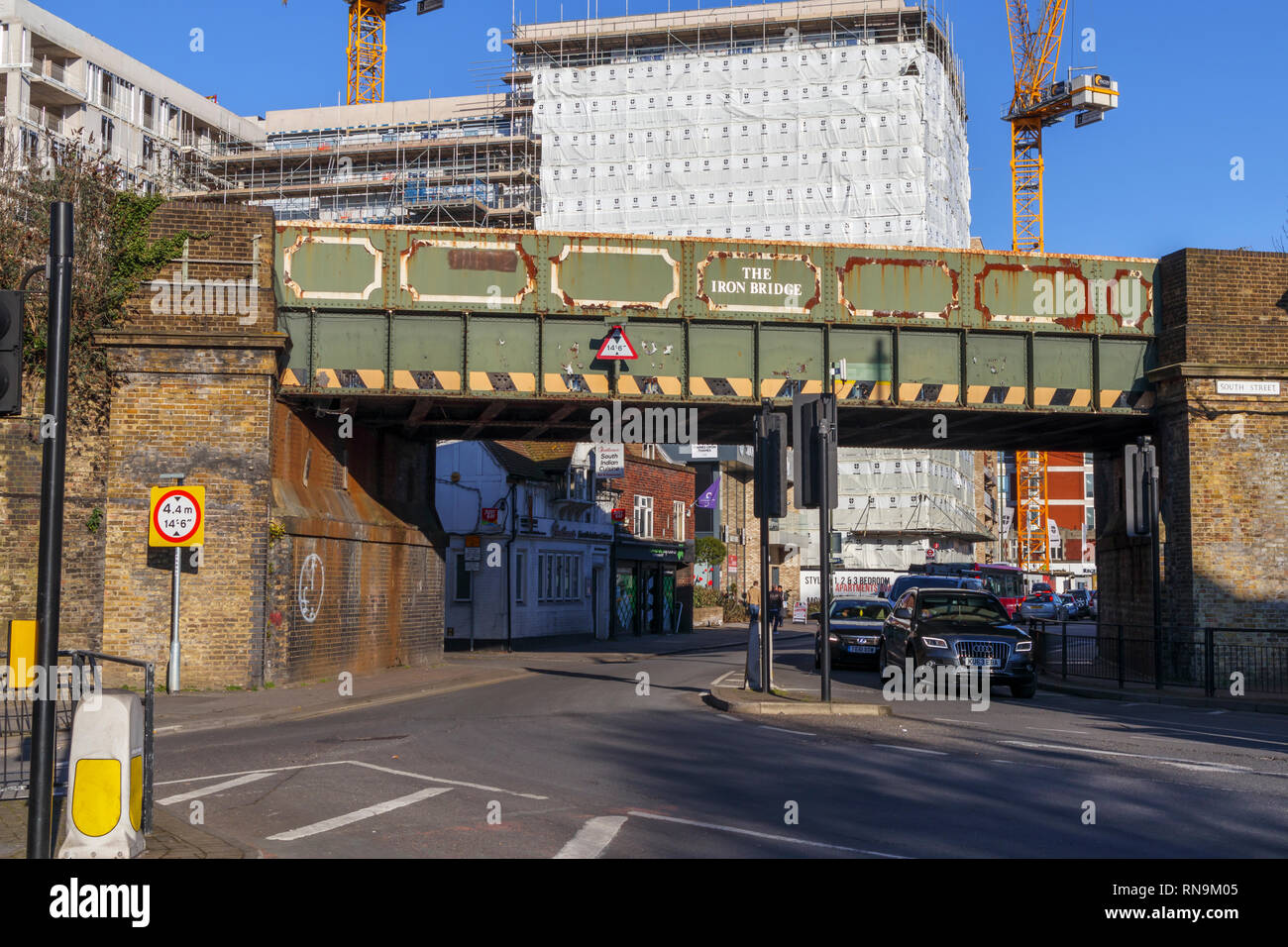 Development of a new apartment block behind the Iron Bridge, a railway