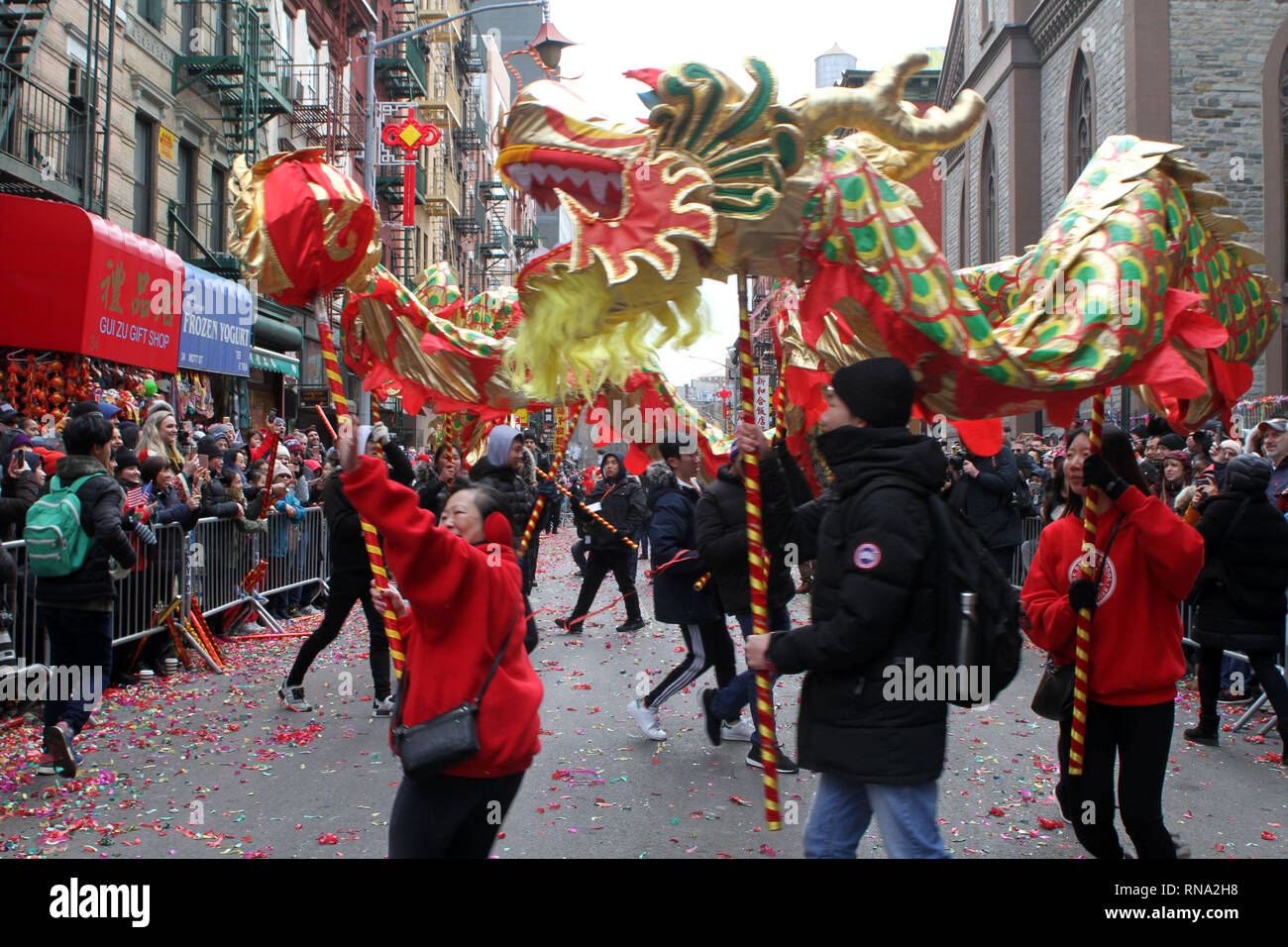 New York, New York, USA. 17th Feb, 2019. A Dragon dances for thousands that packed the streets of Chinatown on Sunday to celebrate the Lunar New Year during the Chinatown Lunar New Year Parade and Festival in New York City. Colorful lions and dragons dance bringing prosperity and good luck as the year of the pig begins. They are also meant to scare away the old spirit. Credit: Bruce Cotler/Globe Photos/ZUMA Wire/Alamy Live News Stock Photo