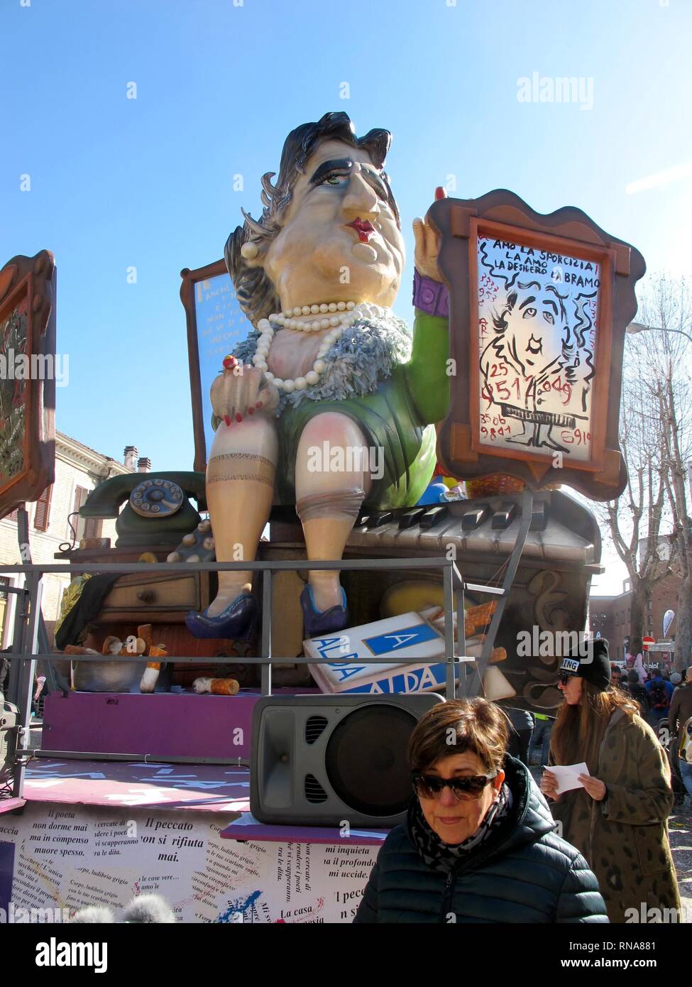 Traditional siflata of the wagons at the Fano Carnival 2019, dedicated to Alda Merini (Vito Panico, Fano - 2019-02-17) p.s. la foto e' utilizzabile nel rispetto del contesto in cui e' stata scattata, e senza intento diffamatorio del decoro delle persone rappresentate Stock Photo