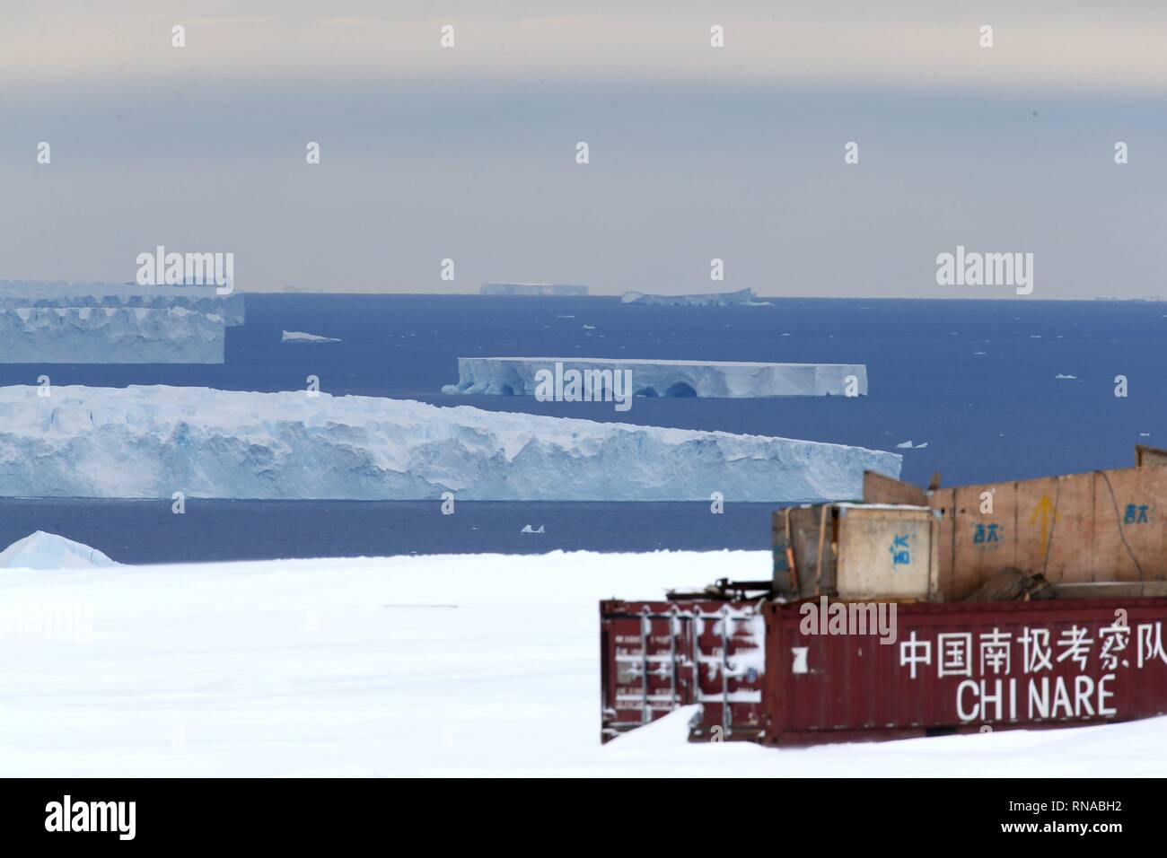 Aboard Xuelong. 10th Feb, 2019. Photo taken on Feb. 10, 2019 shows icebergs on the sea near the Zhongshan Station, a Chinese research base in Antarctica. The Zhongshan Station was set up in February 1989. Within tens of kilometers to the station, ice sheets, glacier and iceberg can all be seen. Credit: Liu Shiping/Xinhua/Alamy Live News Stock Photo