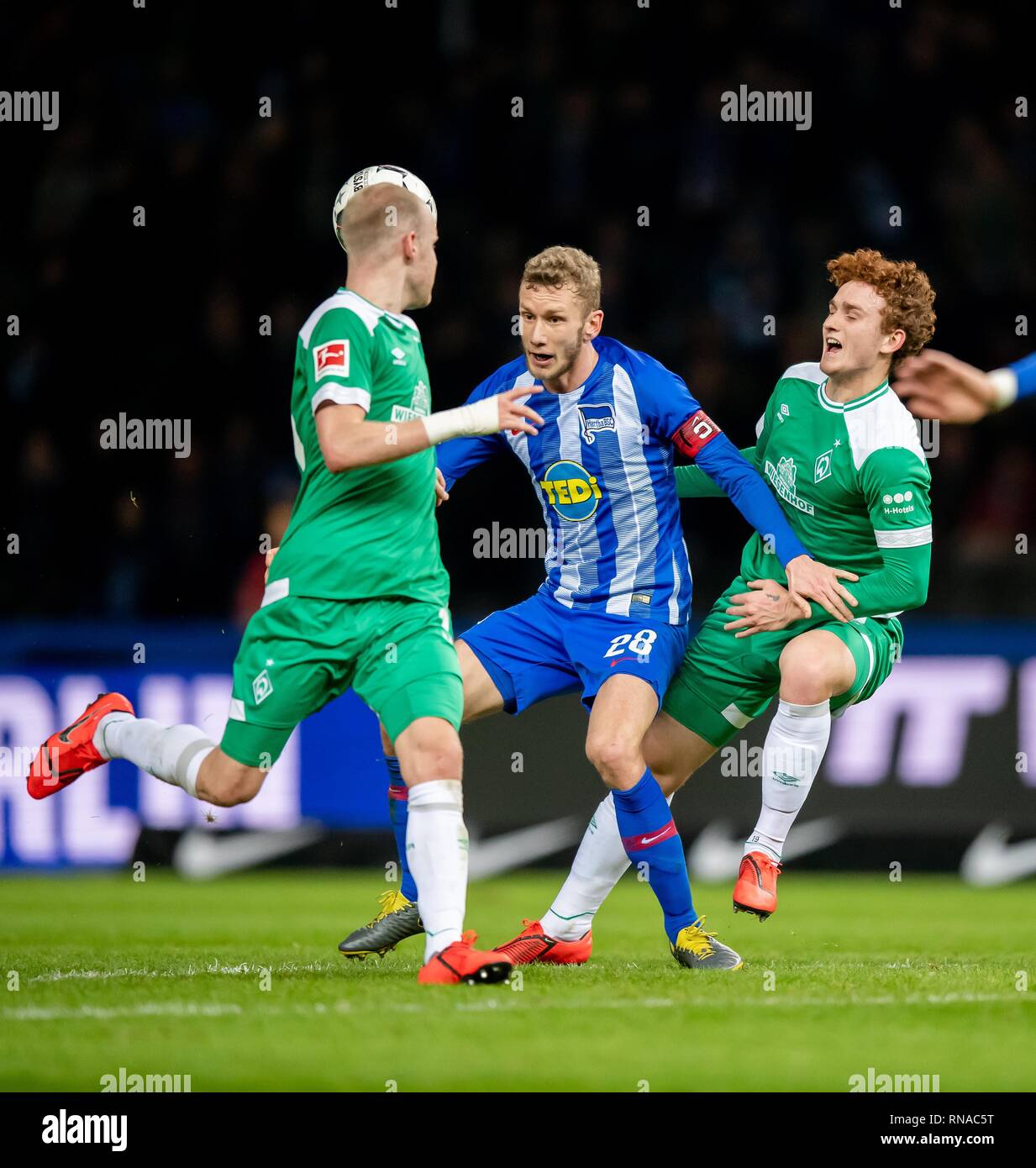 February 16, 2019: Berlin, Olympic Stadium: Football 1st Bundesliga, 22nd  matchday: Hertha BSC - SV Werder Bremen: The duels between Hertha's Fabian  Lustenberger (blue) and Bremen's Josh Sargent causes the free kick,