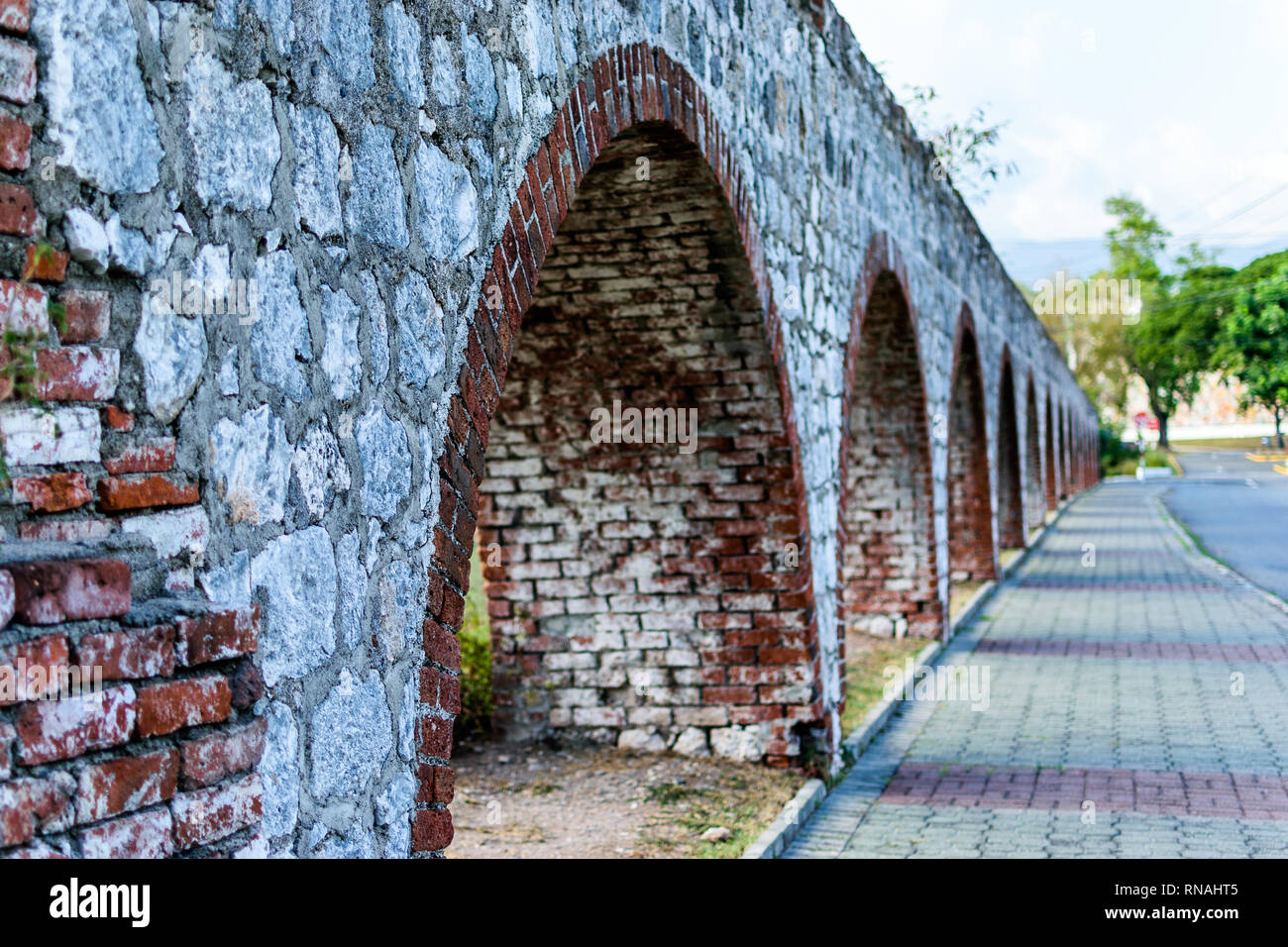 Saint Andrew, Jamaica - September 05 2015: The aqueduct at UWI Mona Campus in Jamaica which once carried water throughout the Mona Hope Estate Stock Photo