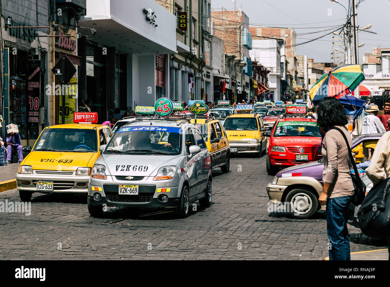 Main road crowded by taxis in rush hour traffic in Arequipa (Peru) Stock Photo