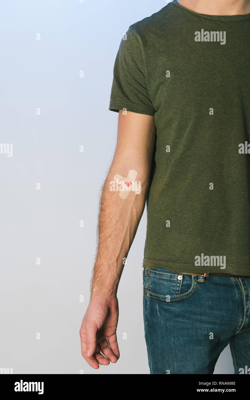 khaki shirt with blue jeans