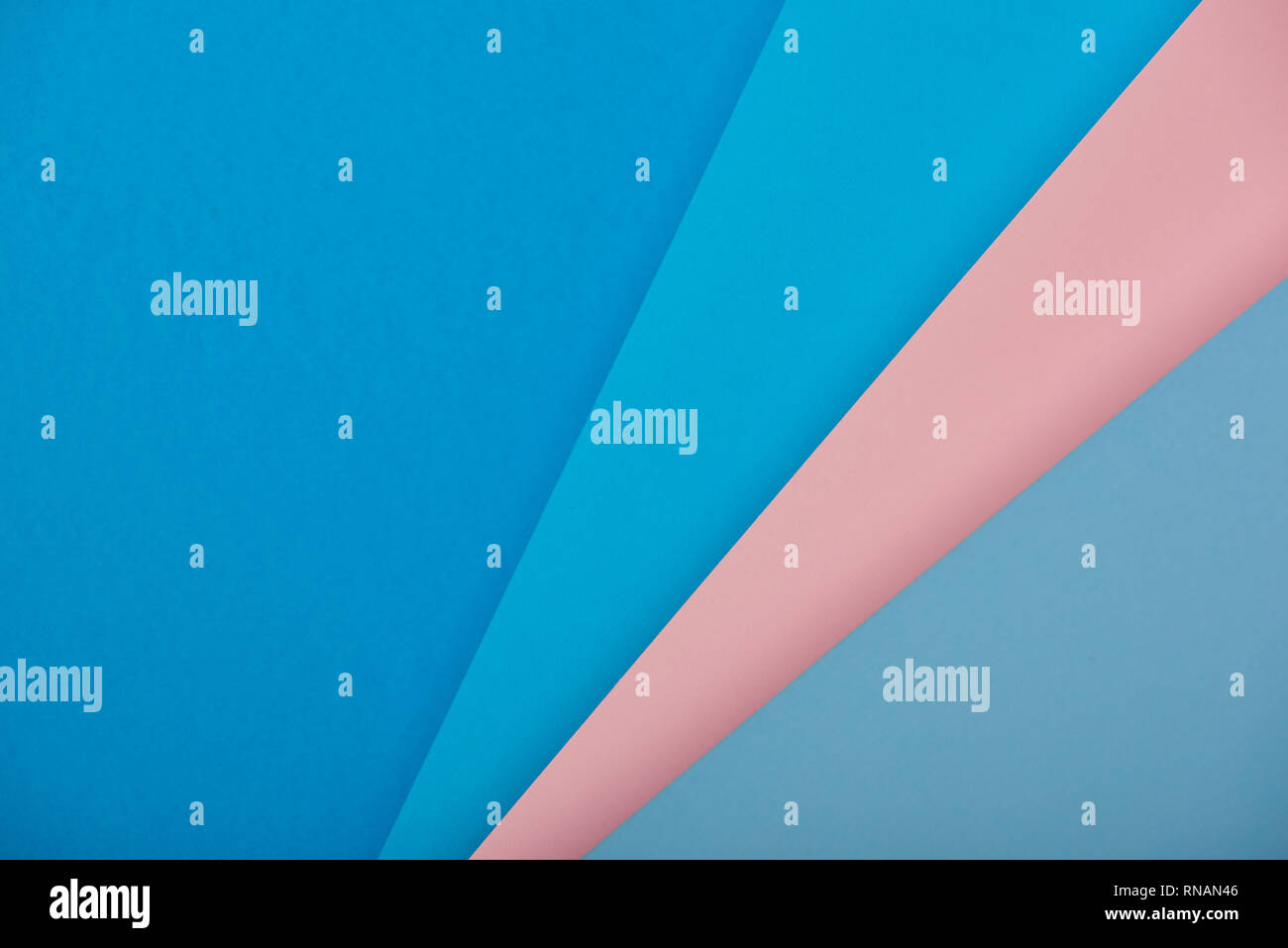 top view of blue and pink paper sheets with copy space Stock Photo