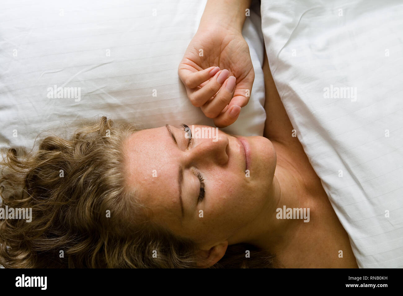 Beautiful Mature Blonde Sleeps In Bed Rest And Sleep Stock Photo Alamy