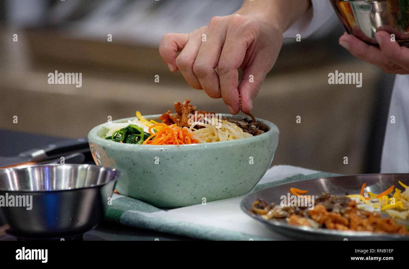 Bibimbap, Traditional Korean cuisine bibimbap, Chef preparing Korean ...