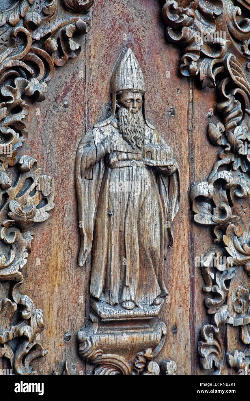 Beautiful door art at San Agustin Church is the oldest church in the Philippines, first built in 1571 and  destoryed many times by national desasters  Stock Photo