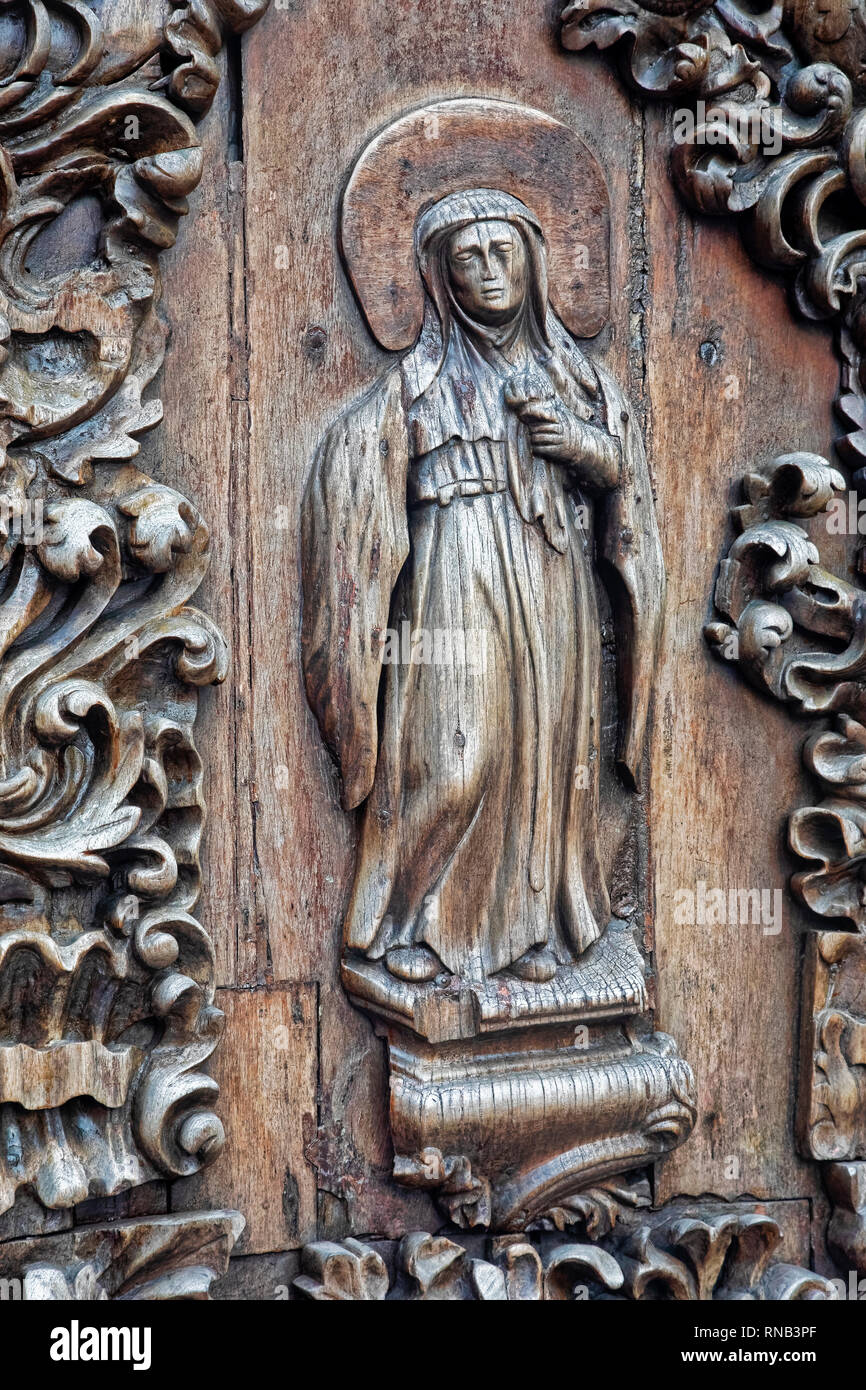 Beautiful door art at San Agustin Church is the oldest church in the Philippines, first built in 1571 and  destoryed many times by national desasters  Stock Photo