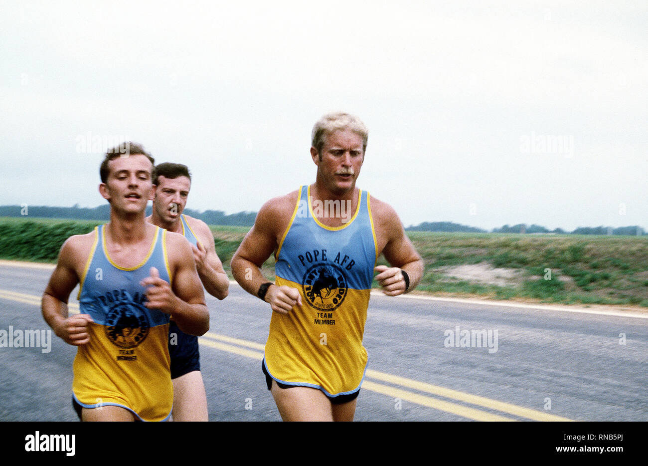 Combat controllers participate in a three-mile run during the Volant ...