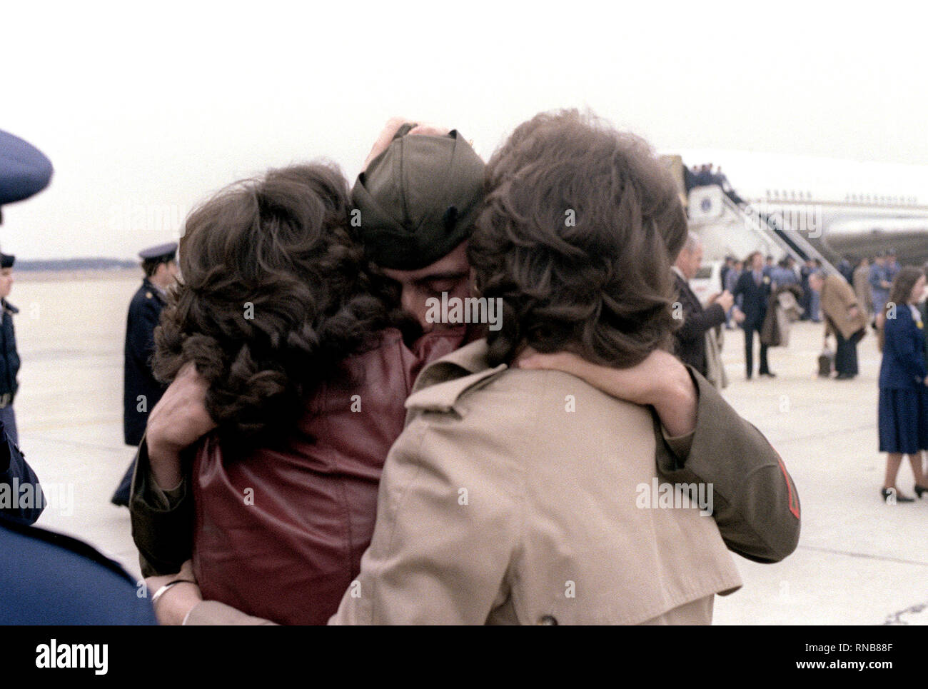 Former Iranian hostage SGT Rodney Sickman is welcomed home by his family. Stock Photo