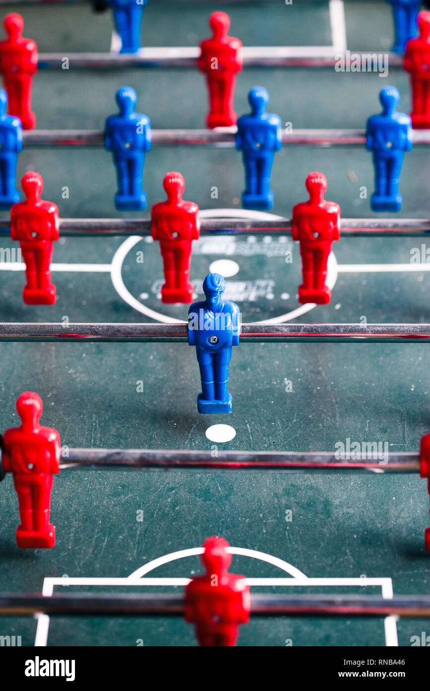 Table football game sport competition two competitors players on field. Closeup of players Stock Photo