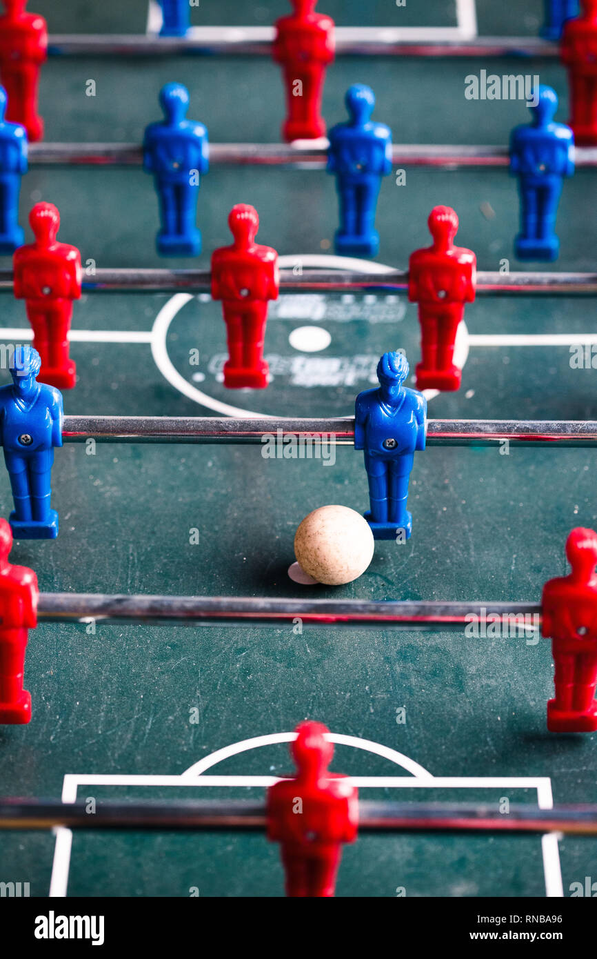 Table football game sport competition two competitors players on field. Closeup of players Stock Photo