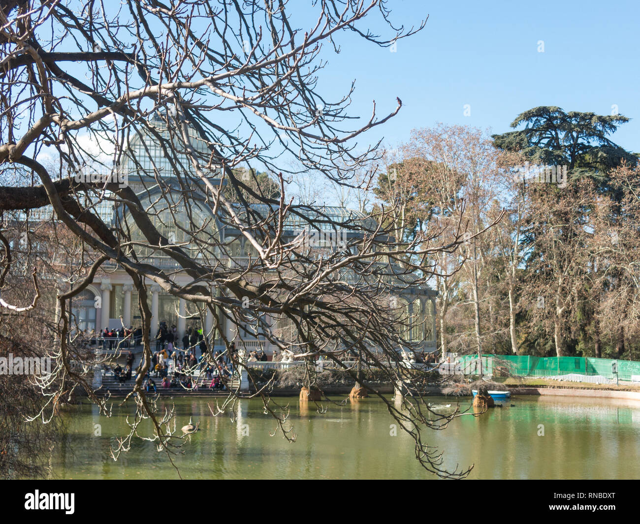 Madrid, Spain - January 27, 2018: Crystal Palace (Palacio de cristal) in Retiro Park in Madrid, Spain. Retiro Park is one of the largest parks of the  Stock Photo